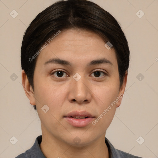 Joyful asian young-adult female with short  brown hair and brown eyes