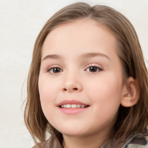 Joyful white child female with medium  brown hair and brown eyes