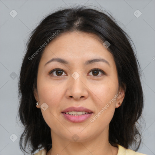 Joyful asian young-adult female with medium  brown hair and brown eyes