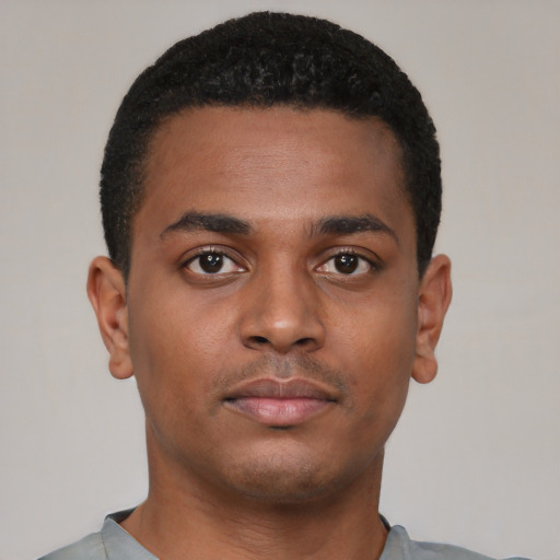 Neutral black young-adult male with short  brown hair and brown eyes