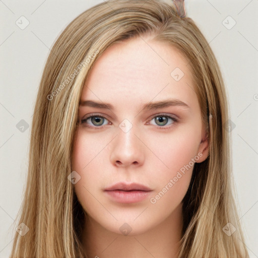 Neutral white young-adult female with long  brown hair and brown eyes