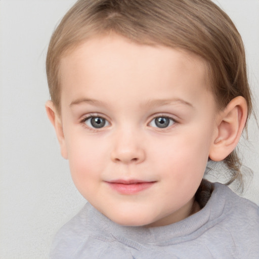 Joyful white child female with medium  brown hair and blue eyes