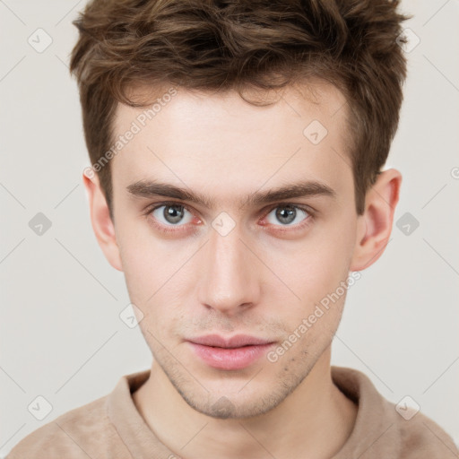 Neutral white young-adult male with short  brown hair and grey eyes