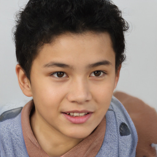 Joyful white child male with short  brown hair and brown eyes