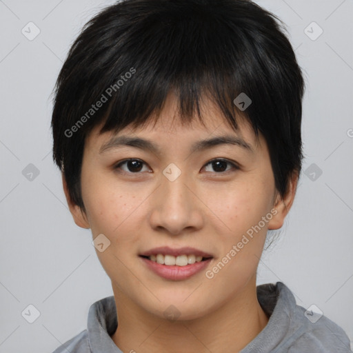 Joyful asian young-adult female with short  brown hair and brown eyes