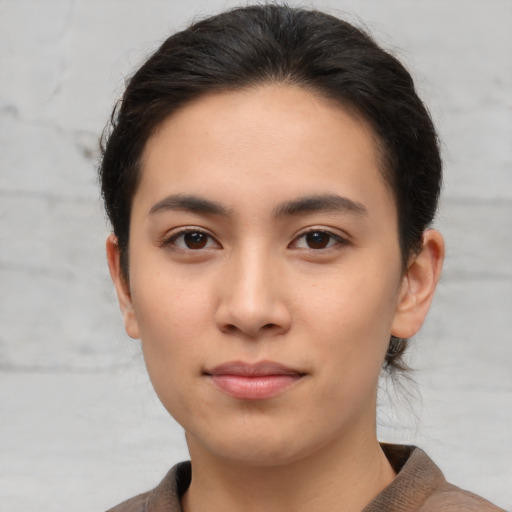 Neutral asian young-adult female with short  brown hair and brown eyes