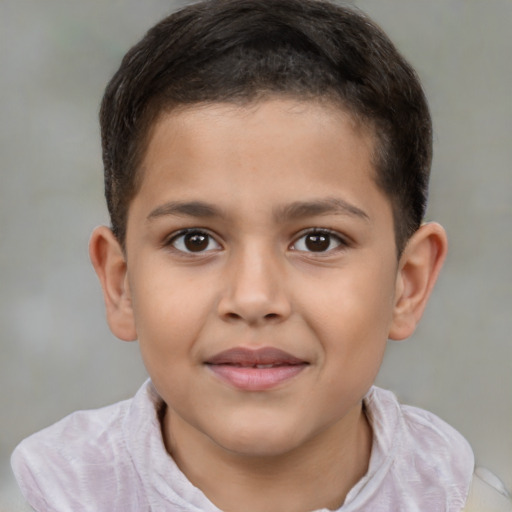 Joyful white child male with short  brown hair and brown eyes