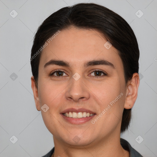 Joyful white young-adult female with medium  brown hair and brown eyes