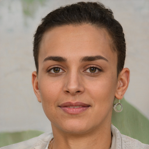 Joyful white young-adult female with short  brown hair and brown eyes