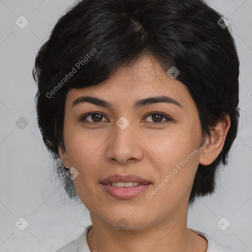 Joyful asian young-adult female with medium  black hair and brown eyes