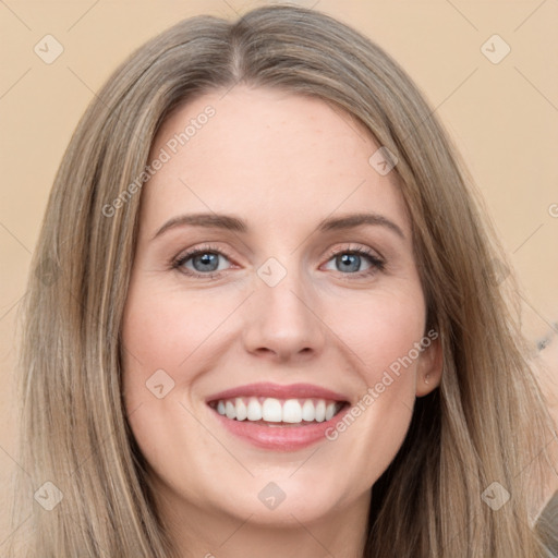 Joyful white young-adult female with long  brown hair and grey eyes