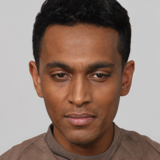 Neutral black young-adult male with short  black hair and brown eyes
