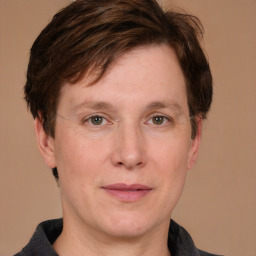 Joyful white adult male with short  brown hair and grey eyes