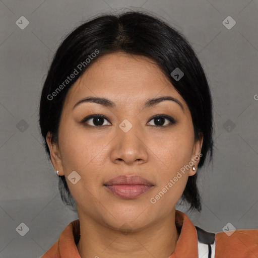 Joyful asian young-adult female with medium  black hair and brown eyes