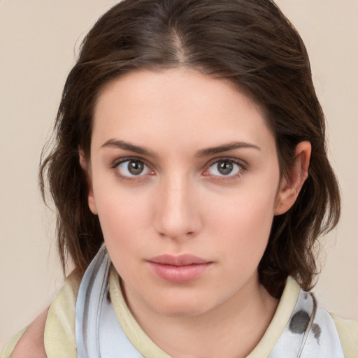 Neutral white young-adult female with medium  brown hair and brown eyes