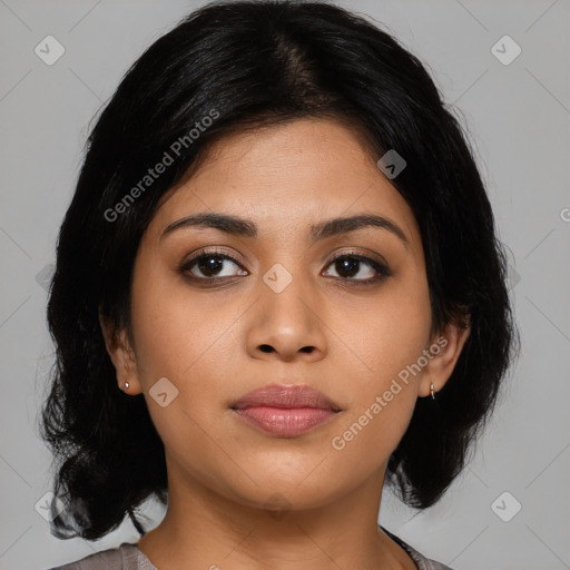 Joyful latino young-adult female with medium  black hair and brown eyes