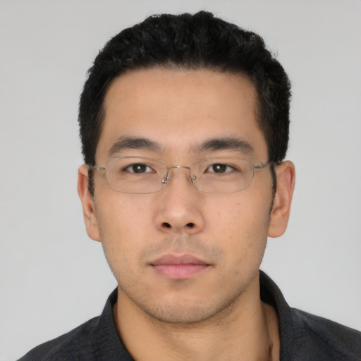 Neutral asian young-adult male with short  black hair and brown eyes