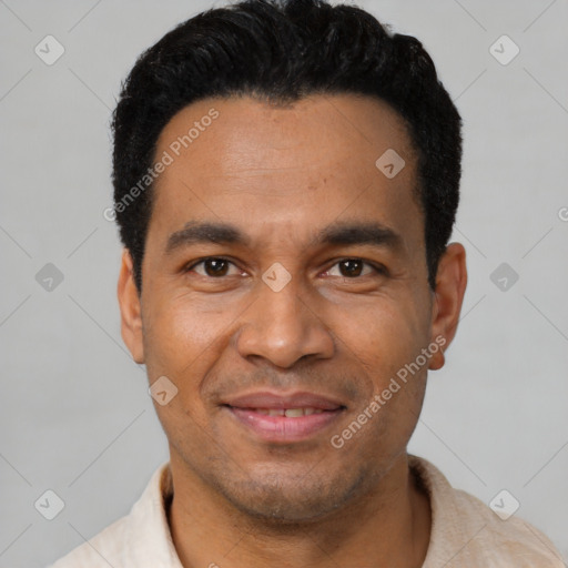 Joyful latino adult male with short  black hair and brown eyes