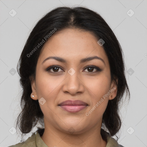 Joyful latino young-adult female with medium  brown hair and brown eyes