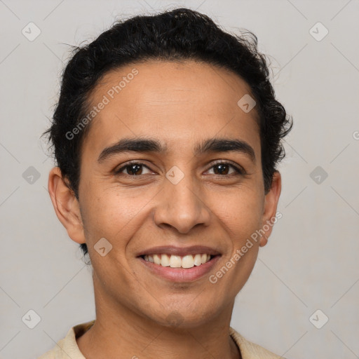 Joyful latino young-adult male with short  brown hair and brown eyes