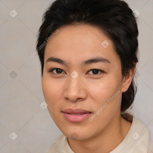 Joyful asian young-adult female with medium  brown hair and brown eyes