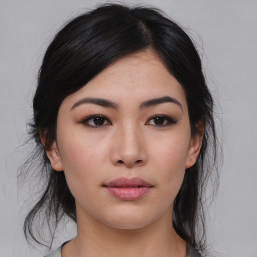 Neutral asian young-adult female with medium  brown hair and brown eyes