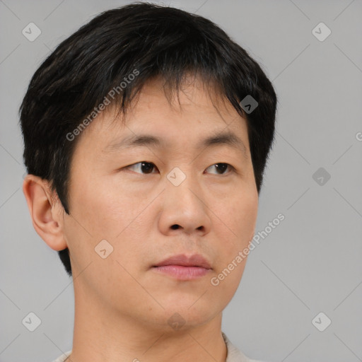 Neutral asian young-adult male with short  brown hair and brown eyes