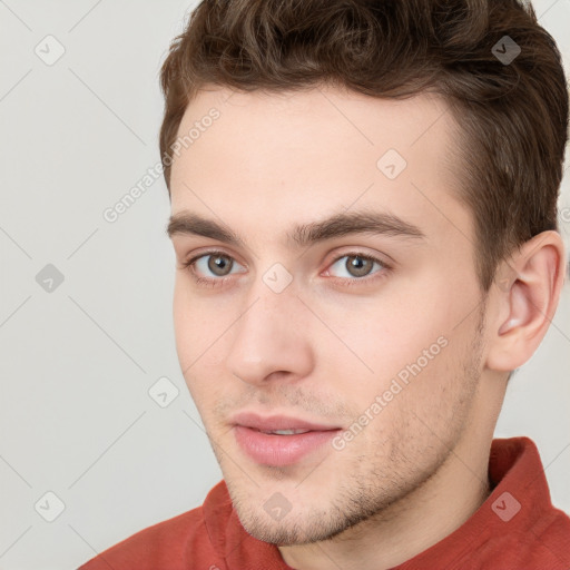 Neutral white young-adult male with short  brown hair and grey eyes