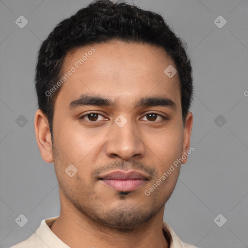 Neutral latino young-adult male with short  brown hair and brown eyes