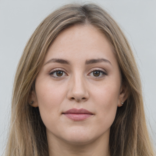 Joyful white young-adult female with long  brown hair and grey eyes