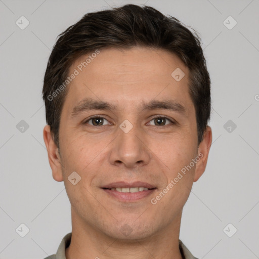 Joyful white adult male with short  brown hair and brown eyes