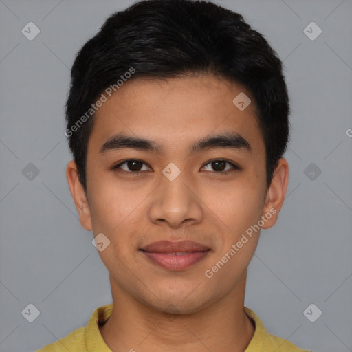 Joyful asian young-adult male with short  black hair and brown eyes