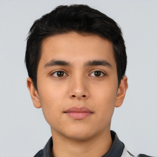 Neutral latino young-adult male with short  black hair and brown eyes
