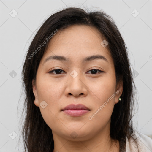 Joyful asian young-adult female with long  brown hair and brown eyes