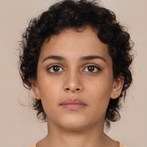 Neutral latino young-adult female with medium  brown hair and brown eyes