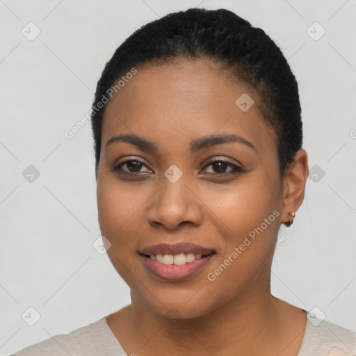 Joyful latino young-adult female with short  black hair and brown eyes