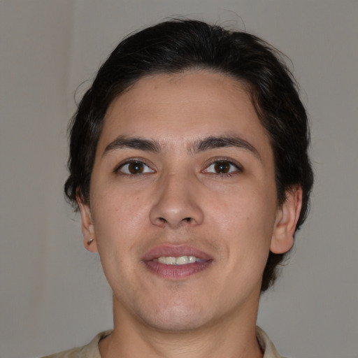 Joyful white young-adult male with medium  brown hair and brown eyes