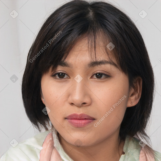 Neutral asian young-adult female with medium  brown hair and brown eyes