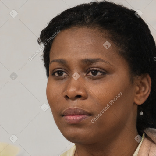 Neutral black young-adult female with short  black hair and brown eyes