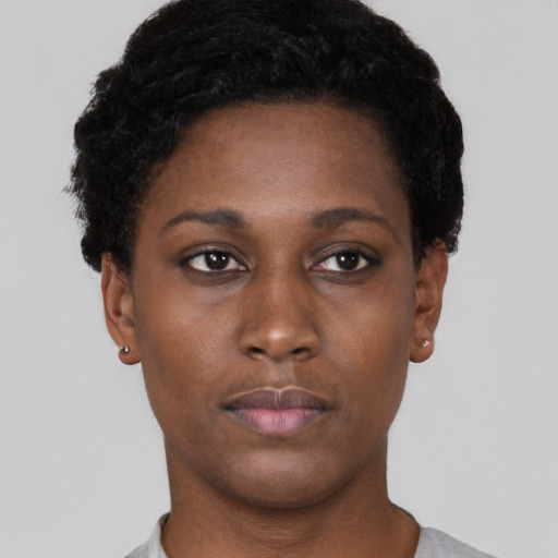 Neutral black young-adult female with short  black hair and brown eyes