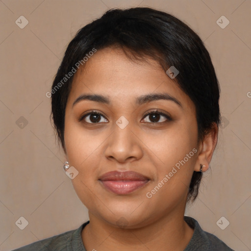 Joyful latino young-adult female with medium  black hair and brown eyes