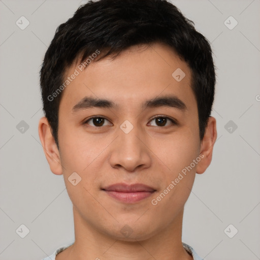 Joyful asian young-adult male with short  black hair and brown eyes