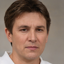 Neutral white adult male with short  brown hair and brown eyes