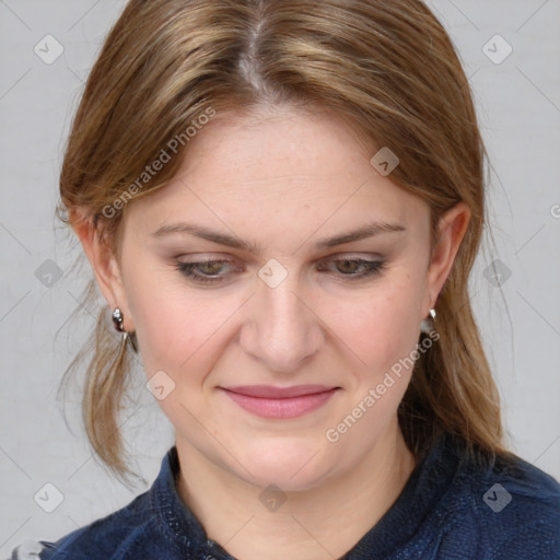 Joyful white young-adult female with medium  brown hair and blue eyes