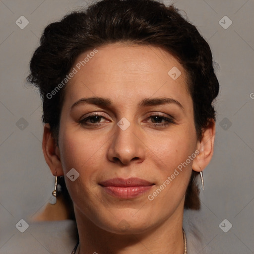 Joyful white adult female with short  brown hair and brown eyes