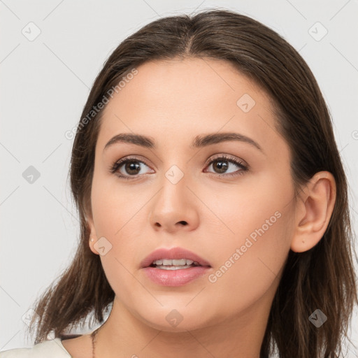 Neutral white young-adult female with long  brown hair and brown eyes