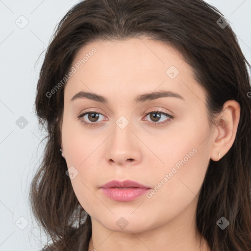 Neutral white young-adult female with long  brown hair and brown eyes