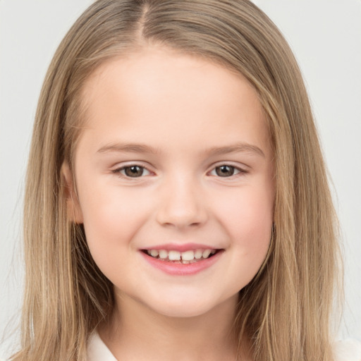 Joyful white child female with long  brown hair and brown eyes