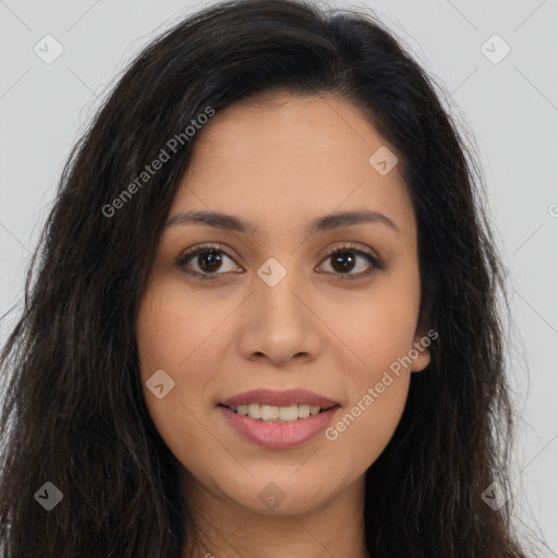 Joyful latino young-adult female with long  brown hair and brown eyes