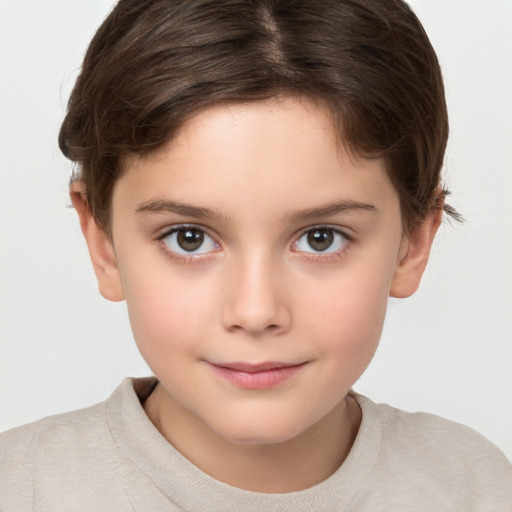 Joyful white child female with short  brown hair and brown eyes